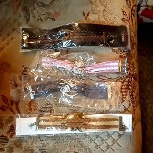 Rawhide cord bracelets.